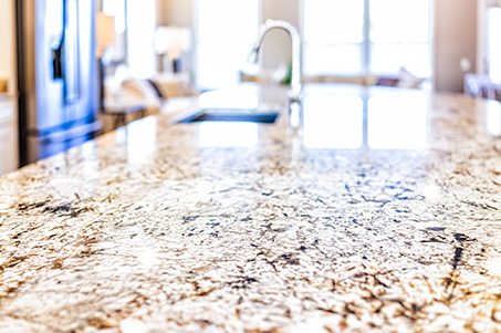 What gives granite its shine?